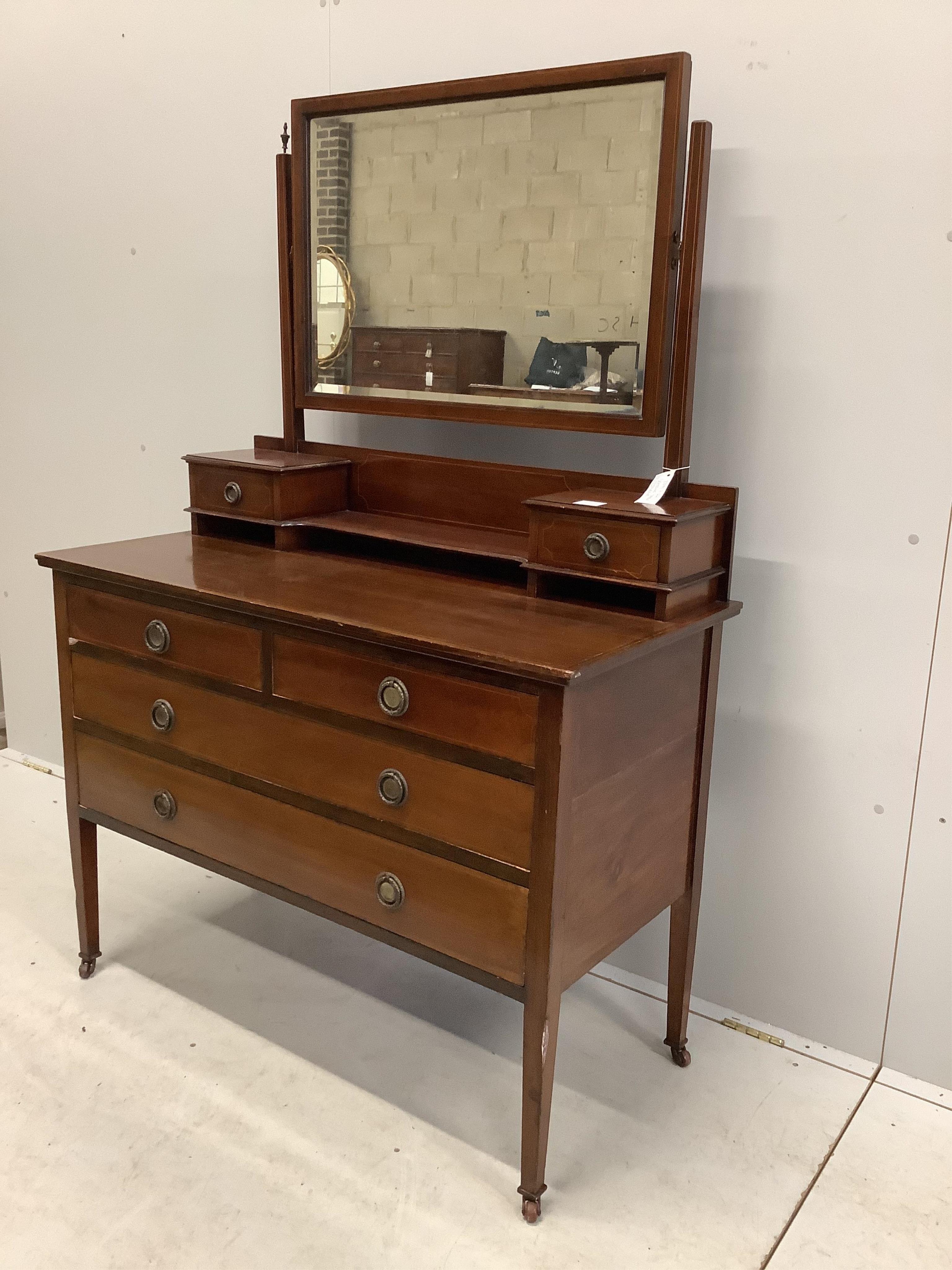 An Edwardian inlaid mahogany dressing chest, width 107cm, depth 50cm, height 156cm. Condition - fair